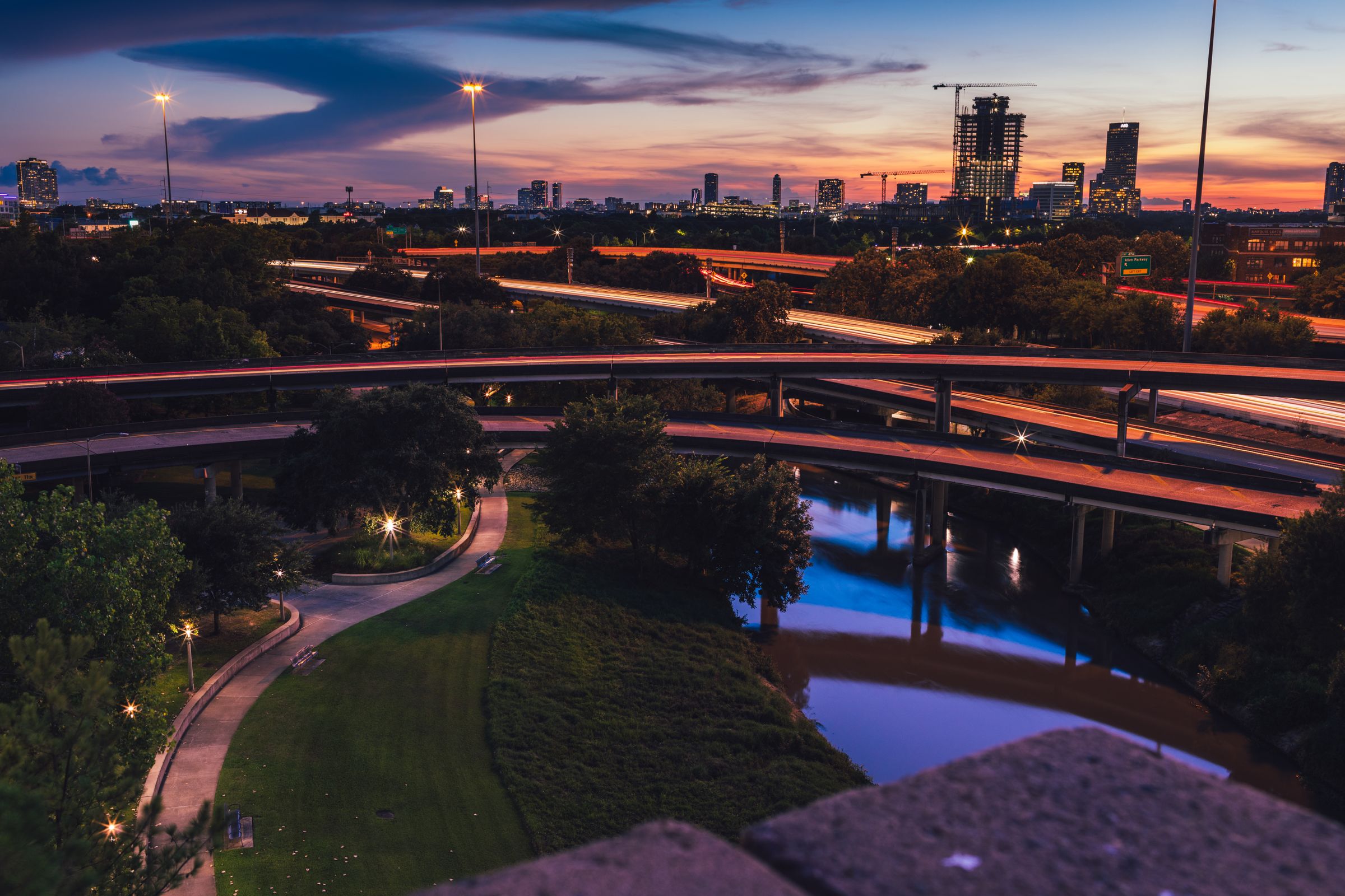 Houston skyline and freeway network at dusk