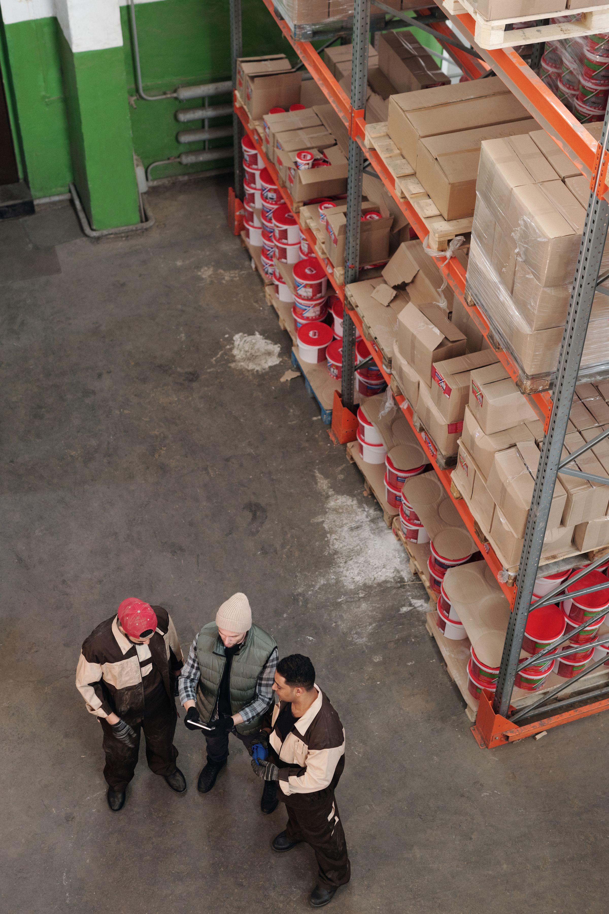 Warehouse professionals reviewing cargo information together